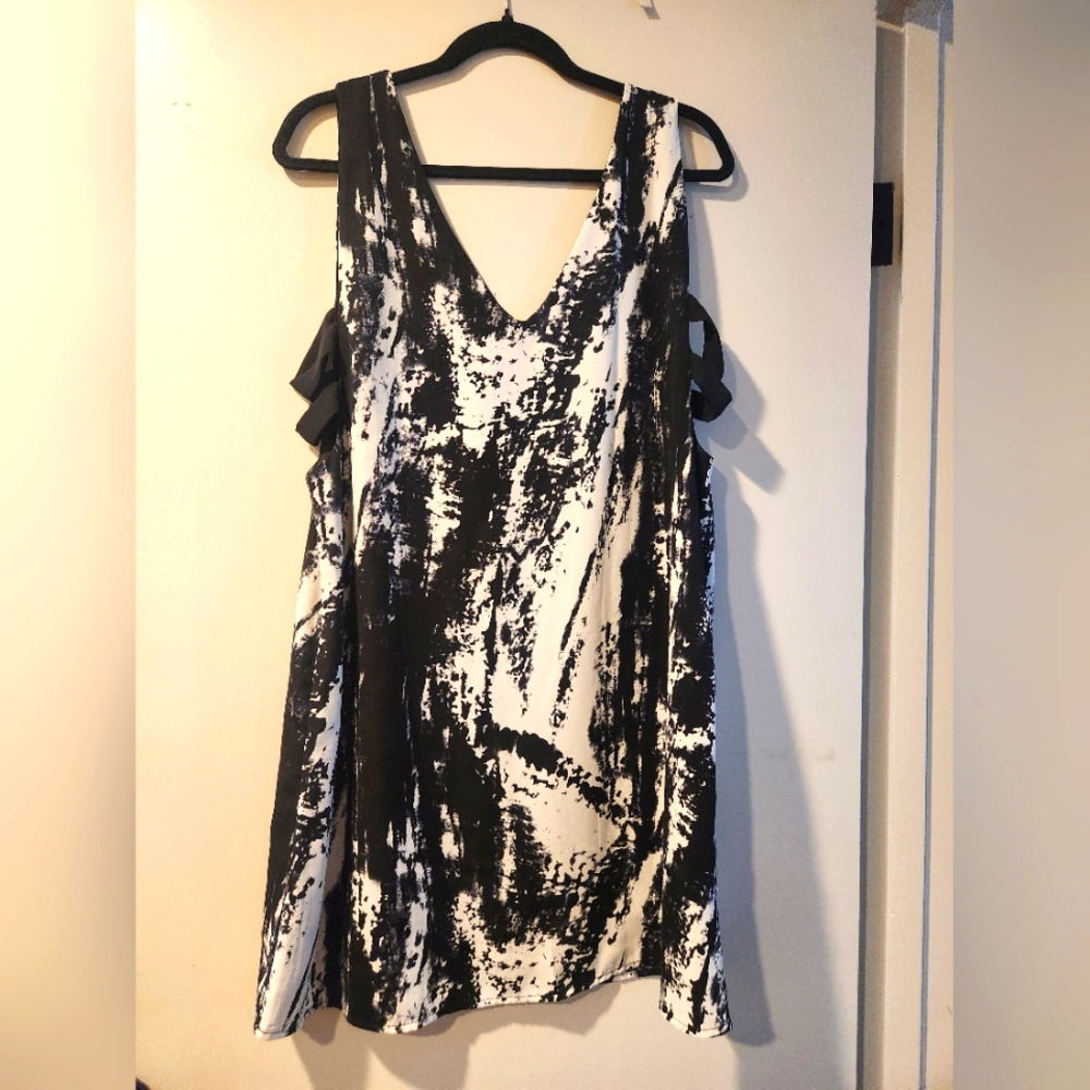 side cutout dress with abstract pattern